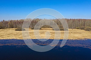 Drone aerial view of huge swamp. Bog is a popular tourist destination, offering visitors a chance to explore the bog