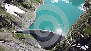 Drone aerial view of the Lake Barbellino an alpine artificial lake and the mountain around it. Italian Alps. Italy