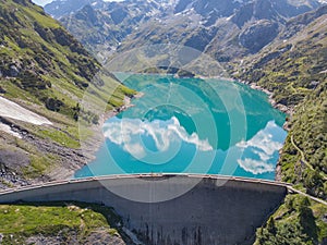 Drone aerial view of the Lake Barbellino an alpine artificial lake and the mountain around it. Italian Alps. Italy