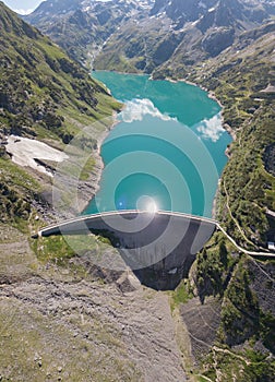 Drone aerial view of the Lake Barbellino an alpine artificial lake and the mountain around it. Italian Alps. Italy