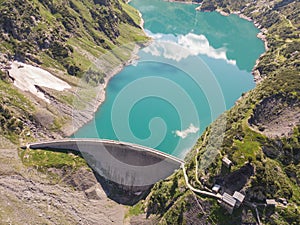 Drone aerial view of the Lake Barbellino an alpine artificial lake and the mountain around it. Italian Alps. Italy