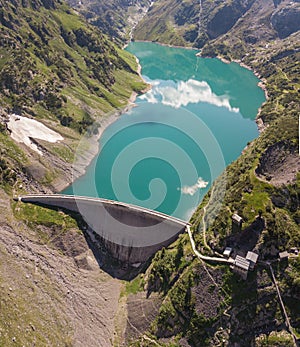 Drone aerial view of the Lake Barbellino an alpine artificial lake and the mountain around it. Italian Alps. Italy