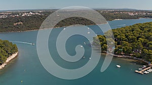 Drone aerial view of Mediterranean sea view with boats in a bay