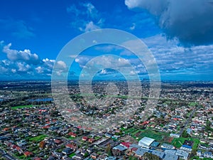 Drone Aerial view of Melbournes western suburbs nice sky green parks