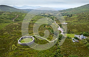 Drone aerial view of ruined Staigue stone fort Iveragh peninsula in County Kerry, Ireland