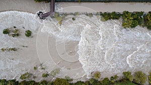 Drone aerial view of the Serio river swollen after heavy rains. Province of Bergamo, northern Italy photo