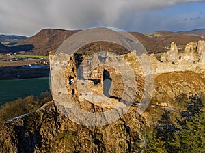 Drone aerial view from south of the Sasov castle during late autumn sunrise