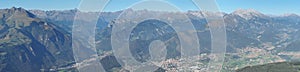 Drone aerial view to the Seriana valley and Orobie Alps in a clear and blue day