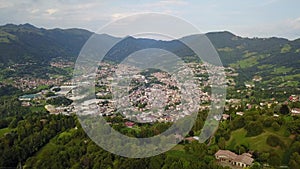 Drone aerial view to the villages of Leffe, Gandino, Casnigo, Peia and Cazzano Sant Andrea, located at Gandino Valley