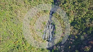 Drone Approaches Gorge with River among Impassable Jungle