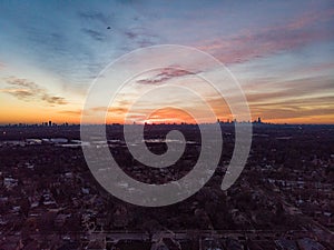 Drone Point of View City of Chicago Skyline Silhouette At Sunrise with Colorful Clouds