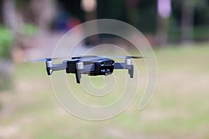 drone copter flying with digital camera.Drone with high resolution digital camera. Flying camera take a photo and video.T