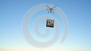 Drone delivering package on the sky background