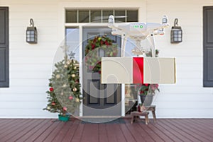 Drone Delivering Wrapped Package with Red Ribbon to Christmas Decorated House Porch