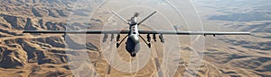 A drone equipped with missiles flies over a vast desert landscape