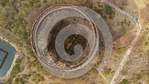 Drone flies over the cooling tower, top view