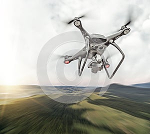 Drone flies in the sky over the mountains.