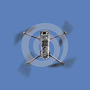 Drone in Flight over a blue sky background