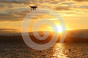 Outlines of a drone over a lake