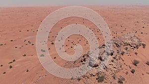 Drone flight over desert sand dunes