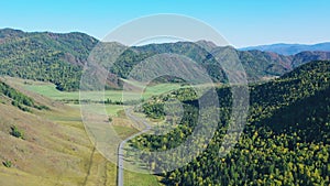 Drone flight over road in mountains