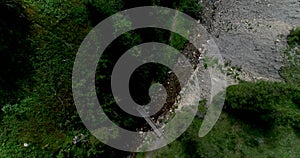 Drone flight in summer over mountain stream in the Nockberge