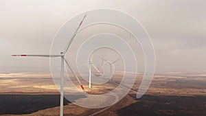 Drone fly above wind turbines field