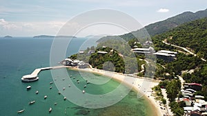 Drone fly over a spectacular beach resort in a tropical island in Asia.