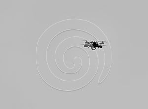 drone flying against a blue sky