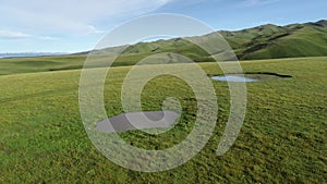 Drone flying over beautiful grassland