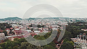 Drone flying over beauty citysspace Lvov, Ukraine over amusement park