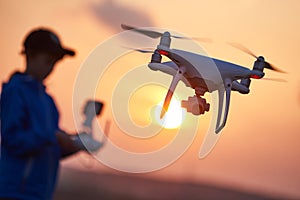 Drone flying at sunset
