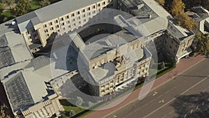 A drone flying from top to bottom near the building of the Supreme Court of the Kyrgyz Republic.