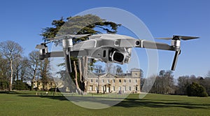 Drone flys by Lydiard House at Lydiard Park  Swindon, Wiltshire, UK