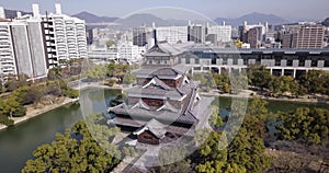 Drone footage of Hiroshima castle and surrounding area.