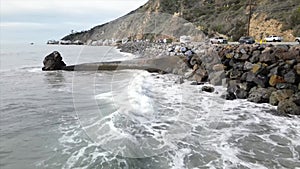Drone footage over Las Tunas County Beach and Pacific Coast Highway, Malibu, California, USA