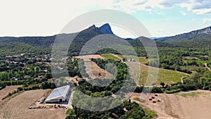 Drone footage of the vineyards at the foot of Pic Saint-Loup Mountain, Languedoc-Roussillon, France