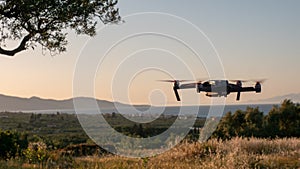 Drone hovering at coastline Greece