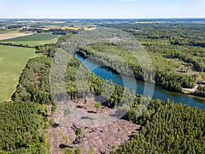 drone image. aerial view of rural area lake in forest with green