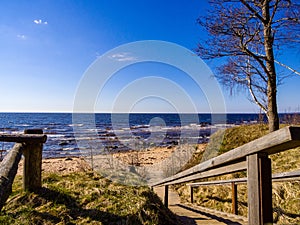 drone image. aerial view of rural area with rocky beach of Baltic sea