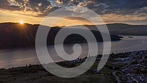 Drone image of sunset over Fort William and Loch Linnhe in the Scottish Highlands