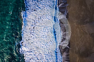 Drone image of waves and beach