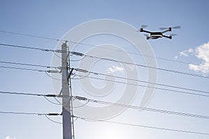 drone inspecting electricity power lines