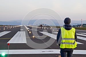 Drone inspection over airport runway with operator