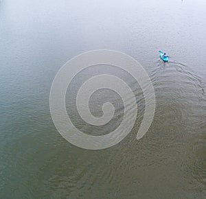 Drone Kayak Alone on a Lake