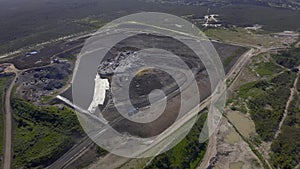Drone, landfill with garbage or dirt, waste management and industrial landscape, pollution and environment outdoor