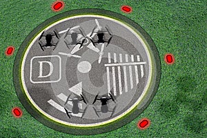 Drone landing site. Concept of droneÃ¢â¬â¢s port or spot or desk to operate UAV. Concrete with marks for unmanned aerial vehicle