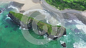 Drone, landscape and nature with sea, island and outdoor with hill, mountain and sustainability in environment. Beach