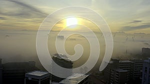 Drone, mist and coast with sunrise, city and Cape Town with environment, South Africa and nature. Buildings, aerial view