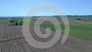 Drone Moving Slowly Panasonic Right to Left View of Amish Countryside, Plowed and Fields Growing